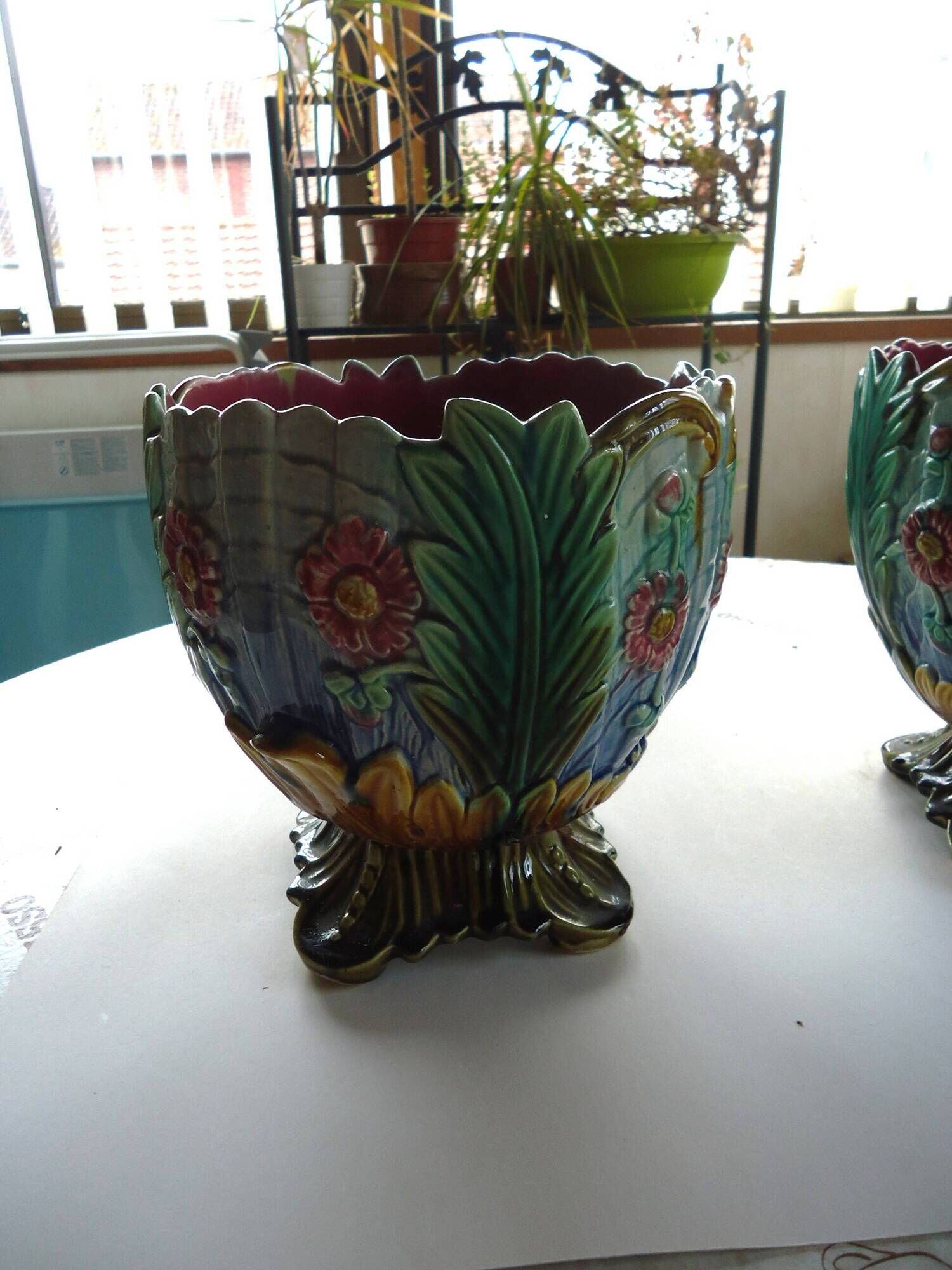Pair of antique ceramic pot covers