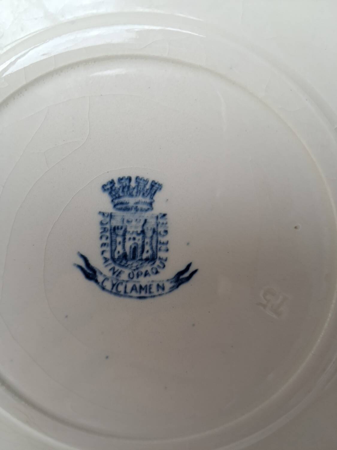 Round Gien porcelain dish with blue cyclamen motif