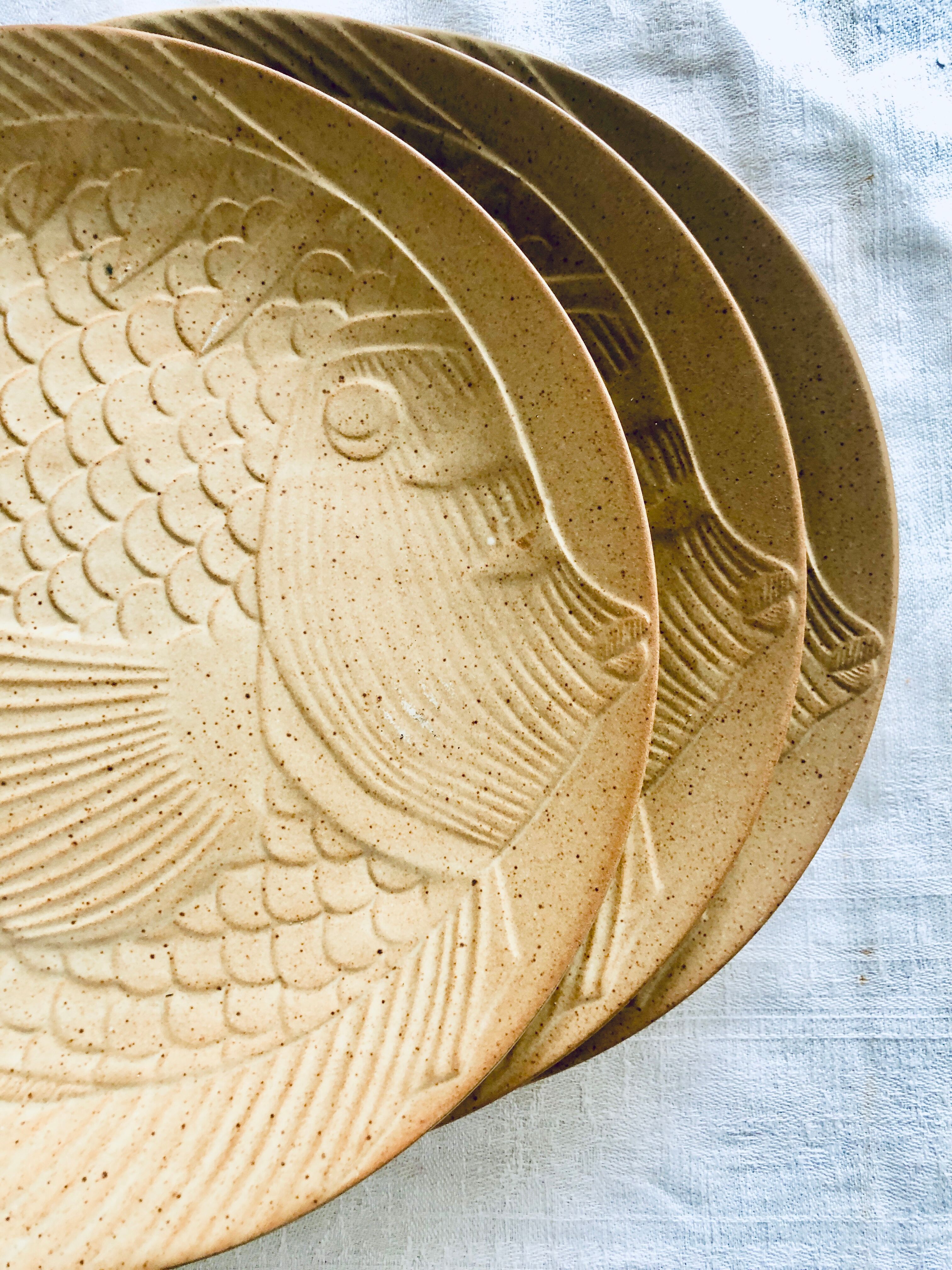 Stoneware plates fish decoration