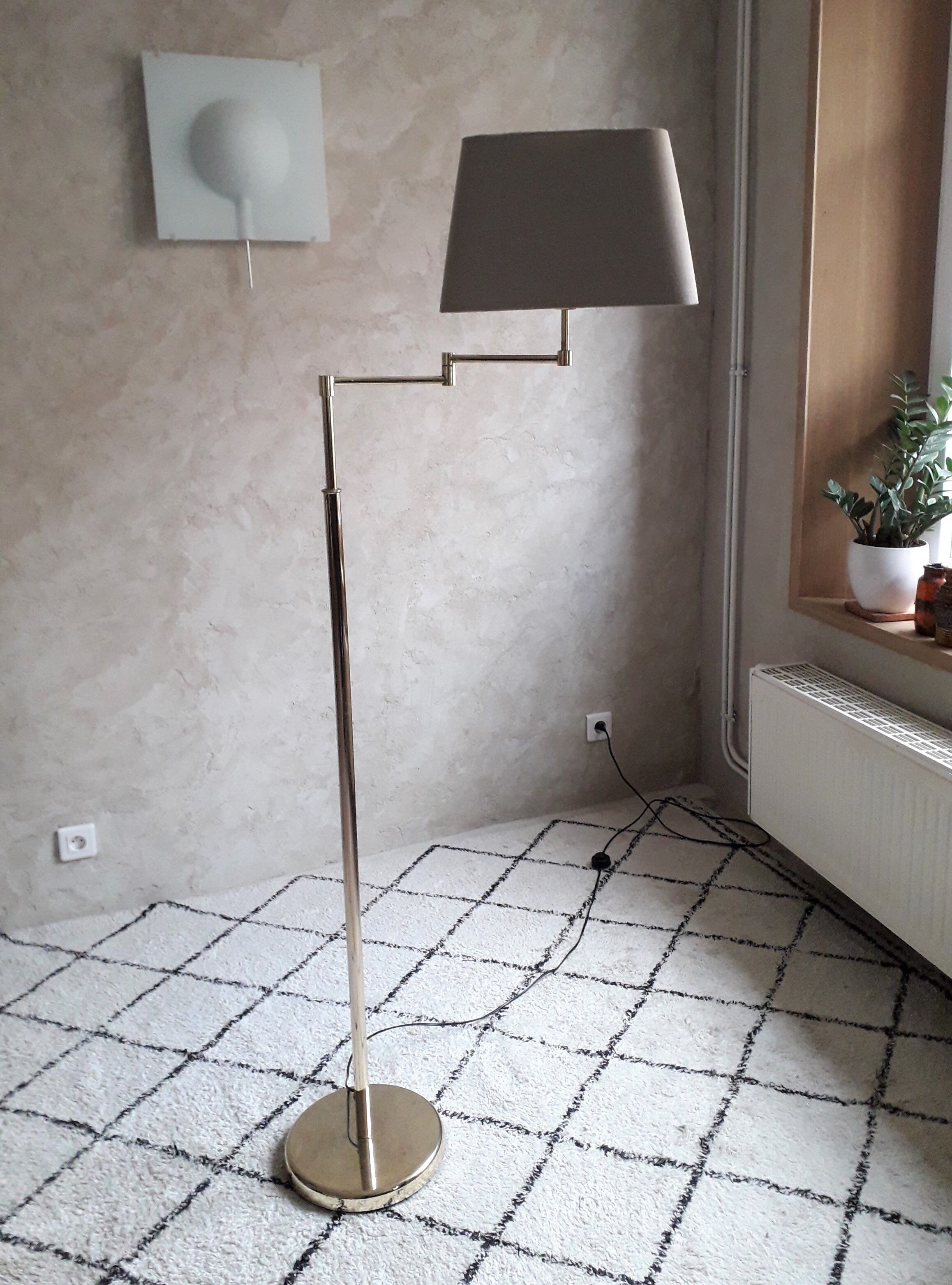 Brass articulated floor lamp