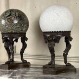 Pair of marble spheres on bronze tripods, 19th century