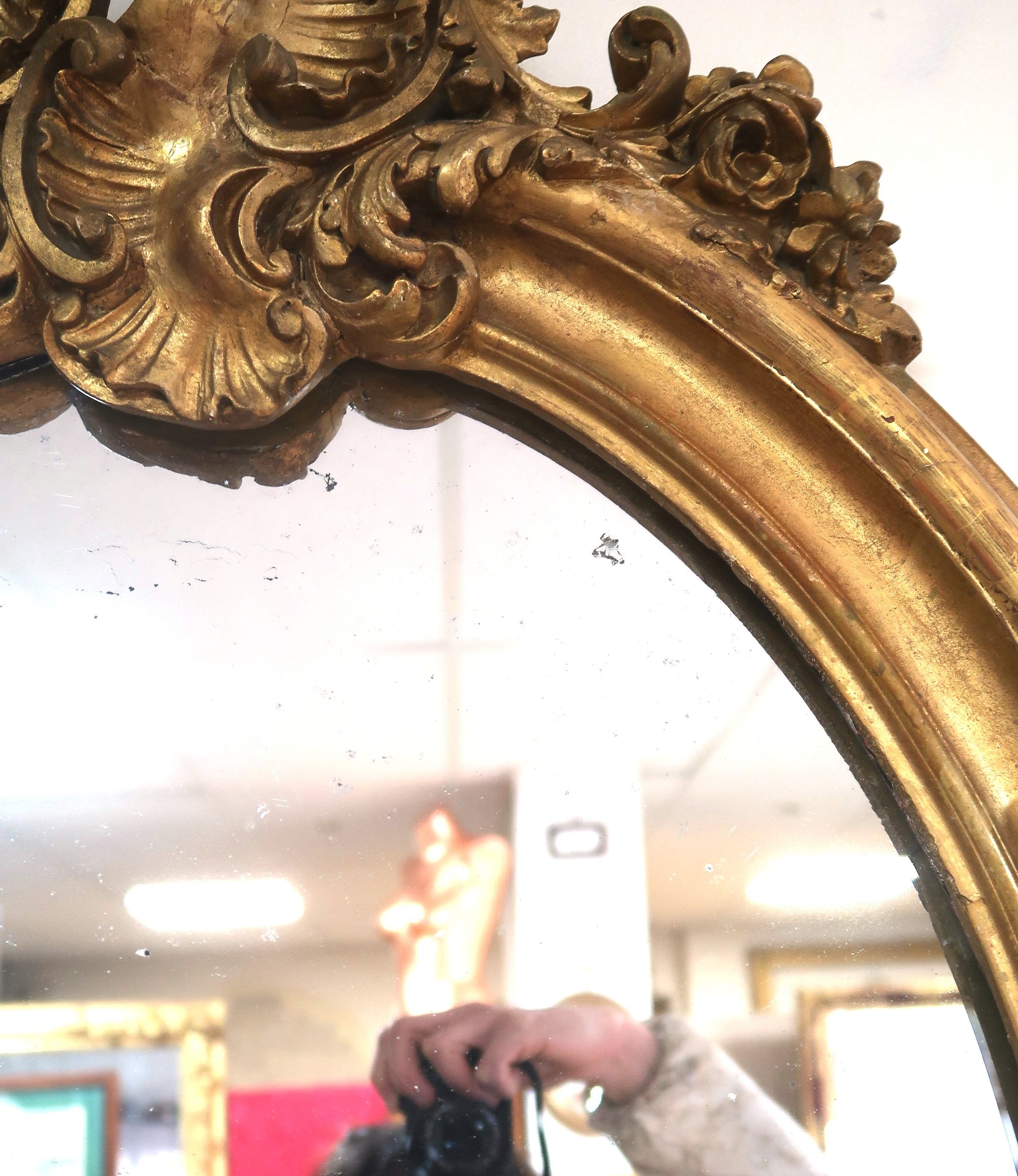 Oval mirror in gilded wood 98x63 cm