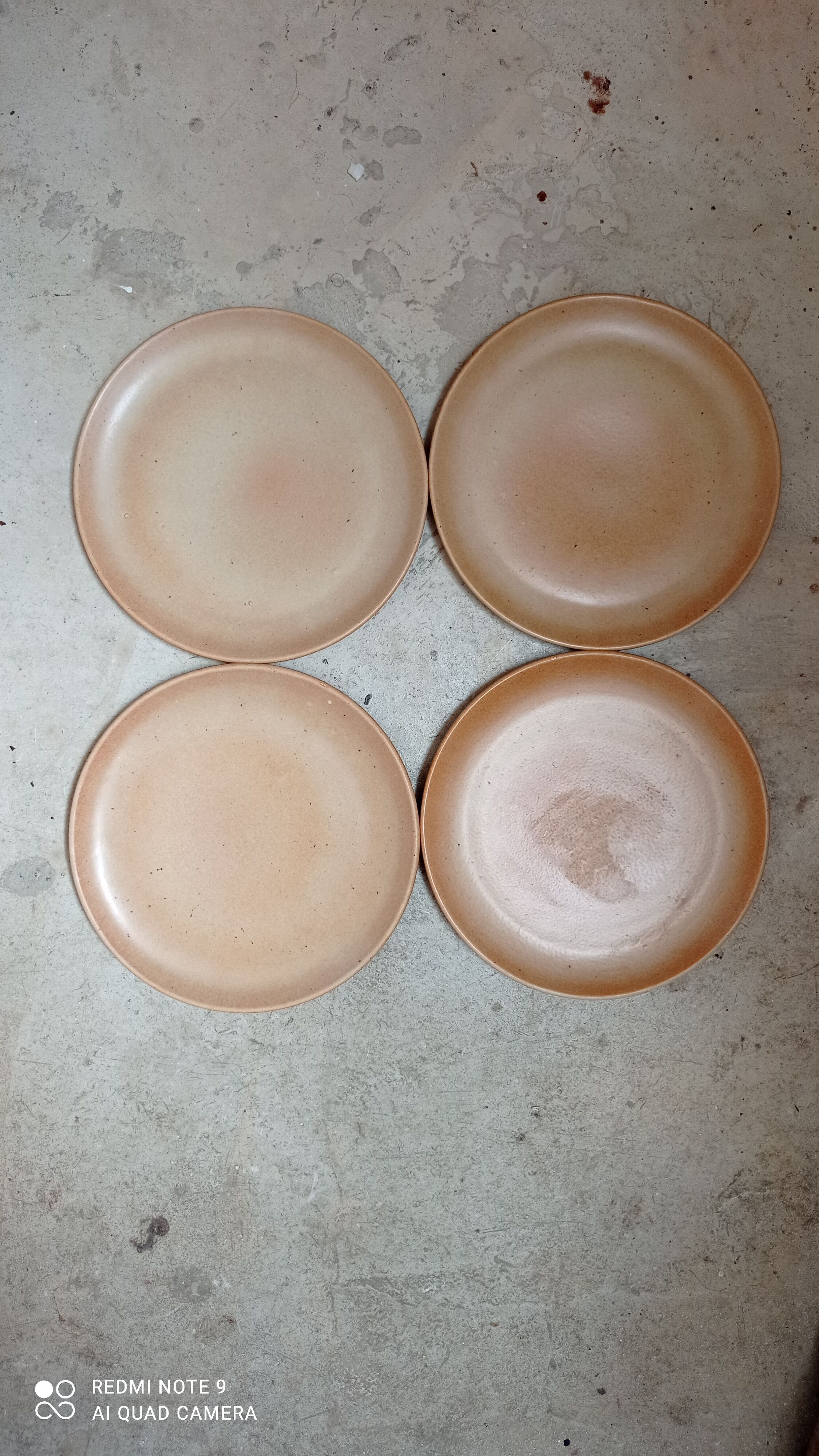 Set of four plates in sandstone