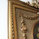 Trumeau mirror with oval decoration and Louis XVI style pediment