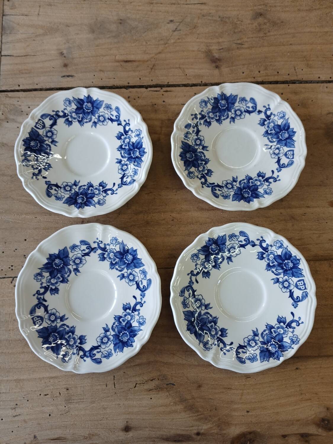 4 antique cups and saucers