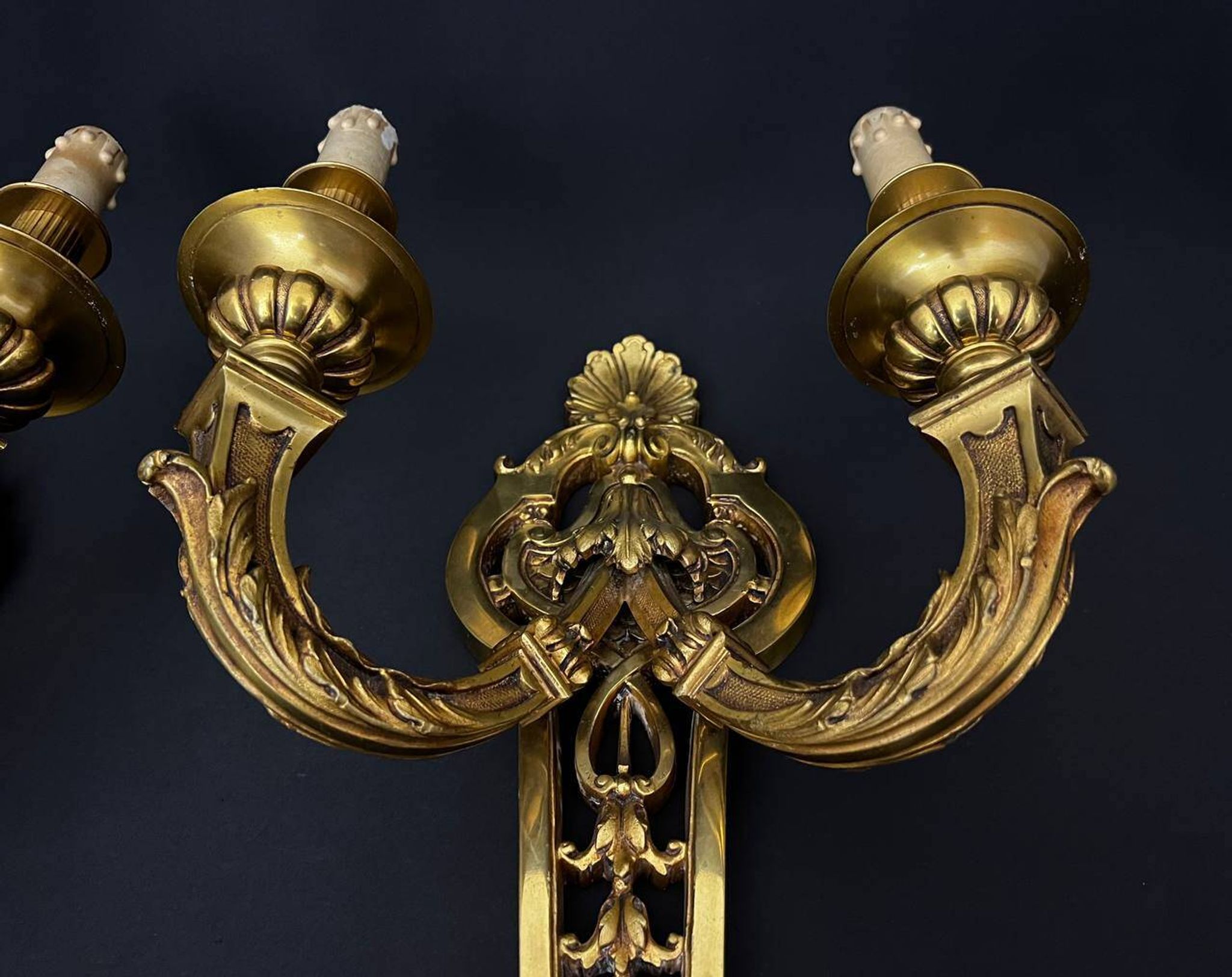 Large pair of gilt bronze wall sconces in the Louis XVI style.