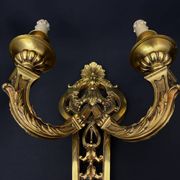 Large pair of gilt bronze wall sconces in the Louis XVI style.