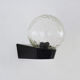 Vintage wall light plastic or bakelite structure, transparent glass globe. Year 70