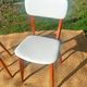 vintage wooden chairs with white faux leather