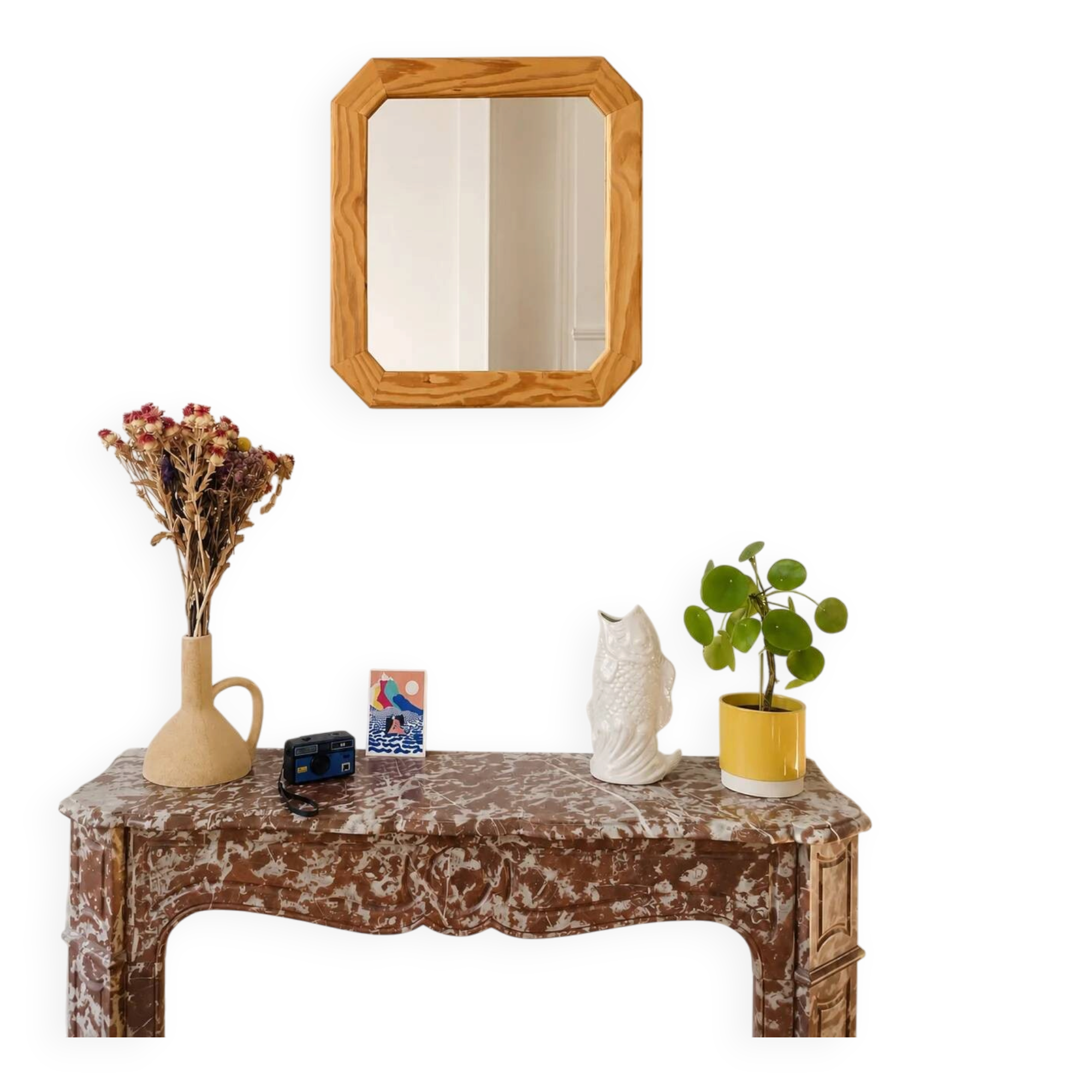 Octagonal mirror in light wood with grooves.