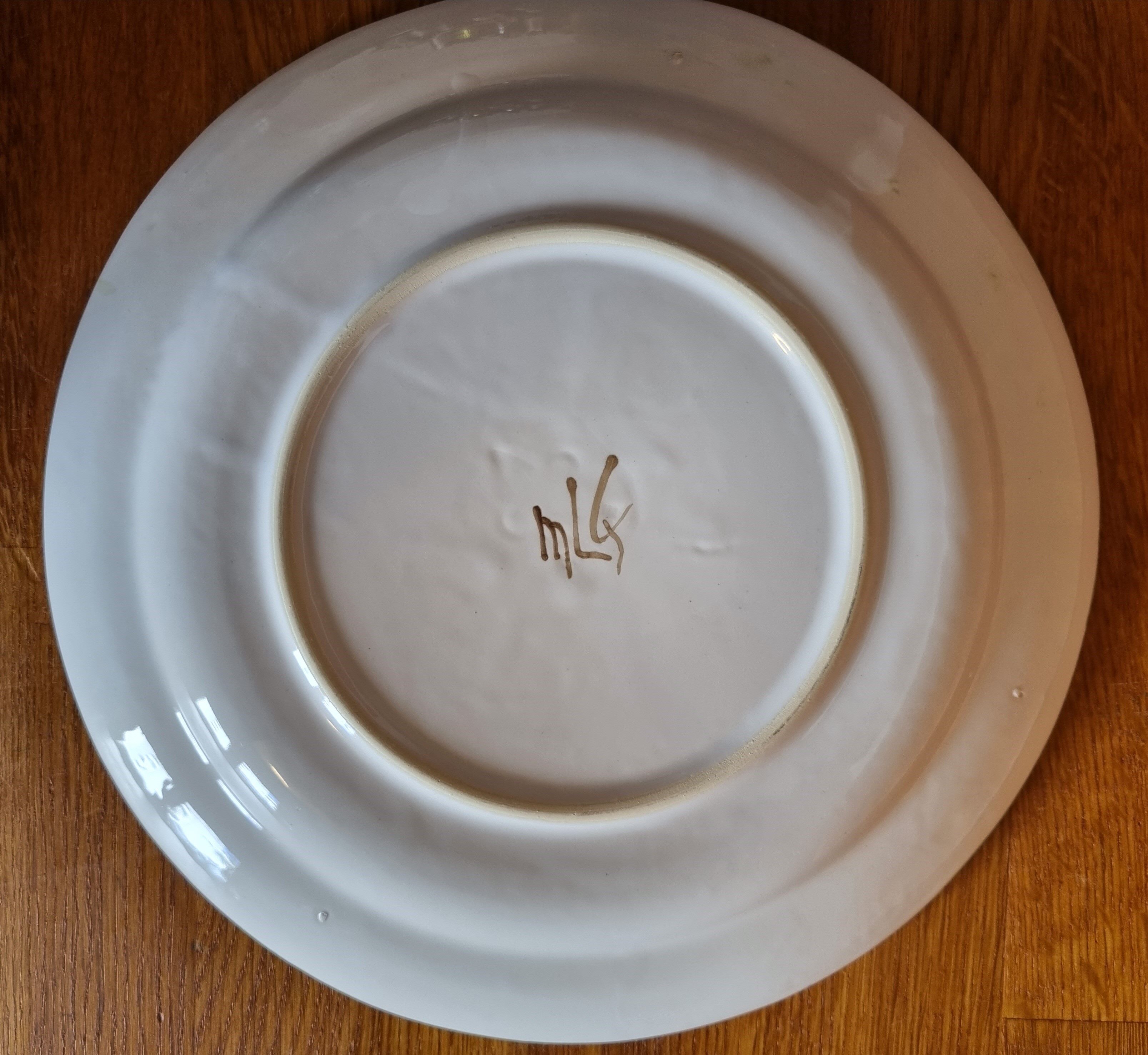 Plate in earthenware of Martres Tolosane decoration Moustiers