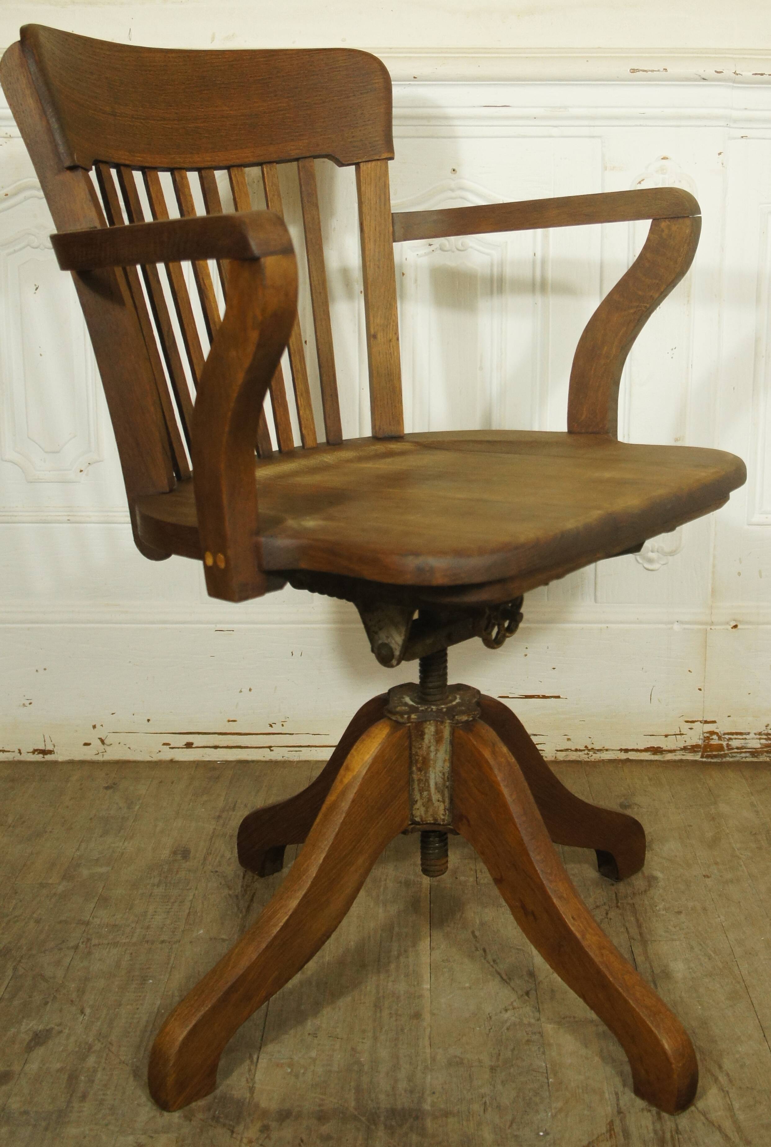 American solid oak armchair, swivel 360 °, tilting & adjustable in height. c. 1920