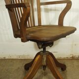 American solid oak armchair, swivel 360 °, tilting & adjustable in height. c. 1920