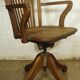 American solid oak armchair, swivel 360 °, tilting & adjustable in height. c. 1920