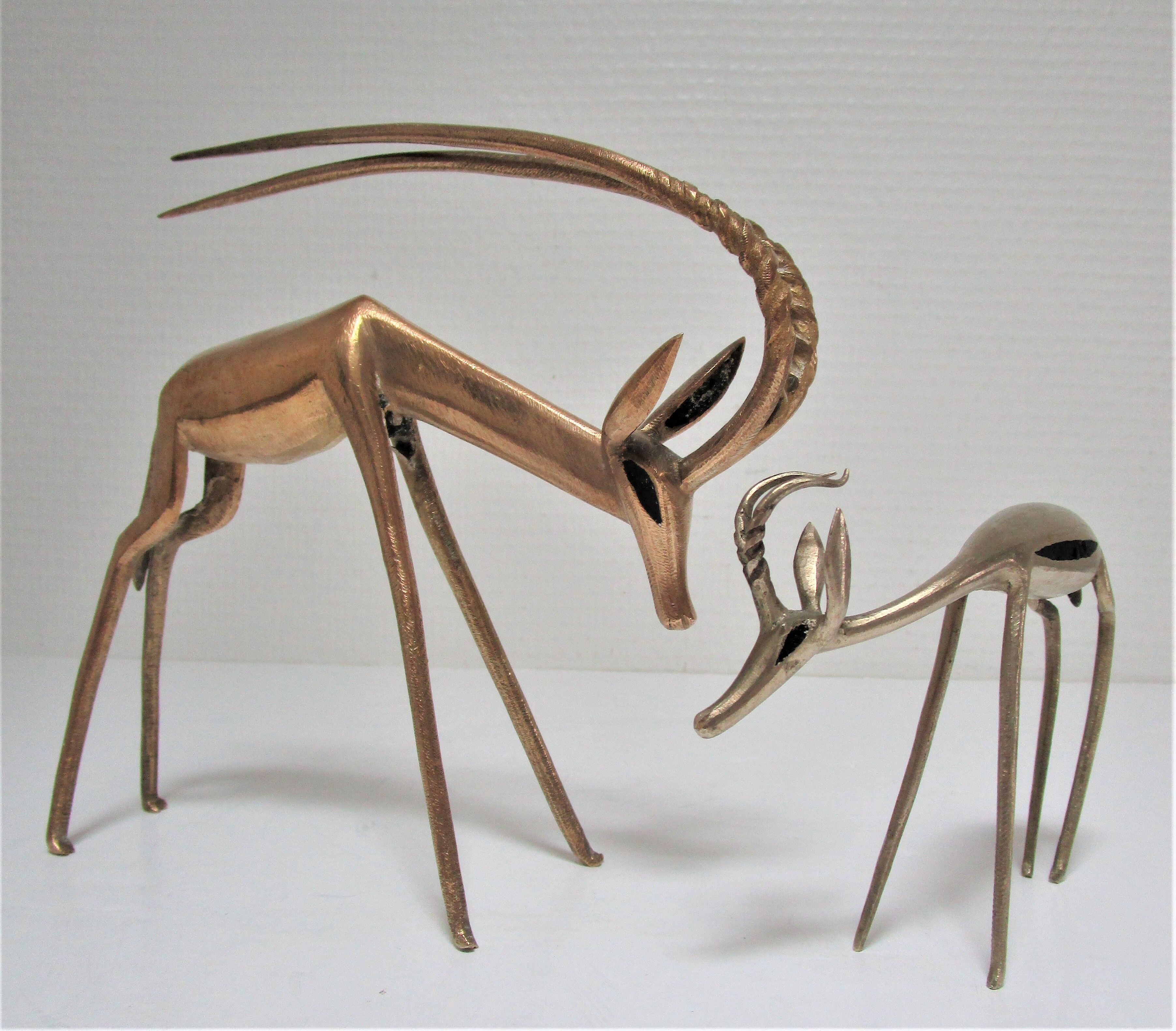 Four vintage brass antelope gazelles