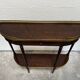 Louis XVI demi-moon console in wood and brass.