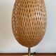 Design lamp in gold metal and wicker