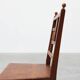 Art Deco oak side chair with carved rosette back and turned front legs, Bel