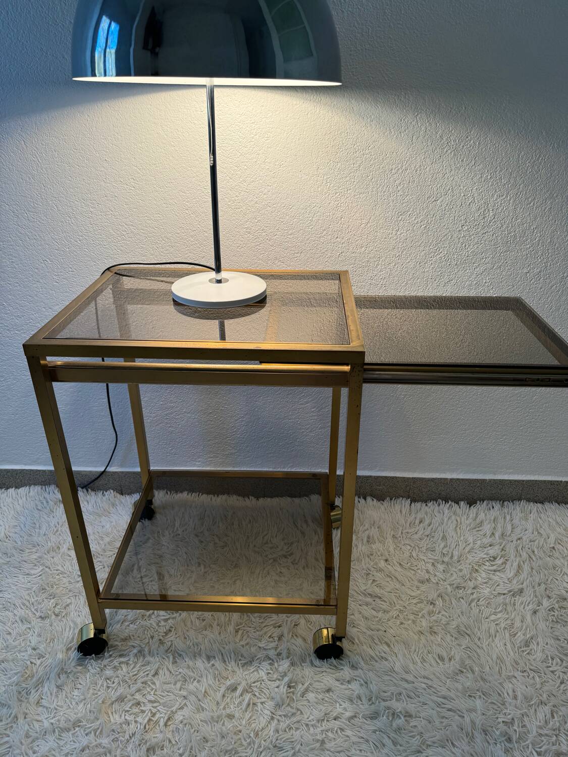 Brass rolling trolley with smoked glass from the 70s