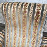 2 Louis XVI bergère armchairs in solid wood with beige and blue embroidered fabric.