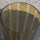 Bayadere patterned vase in glass, transparent and vintage ochre