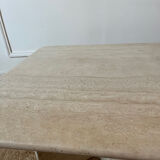 Square coffee table in travertine.