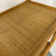 Large woven rattan bookshelf designed in the 1970s.