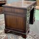 English mahogany pedestal desk with leather top from the 1950s