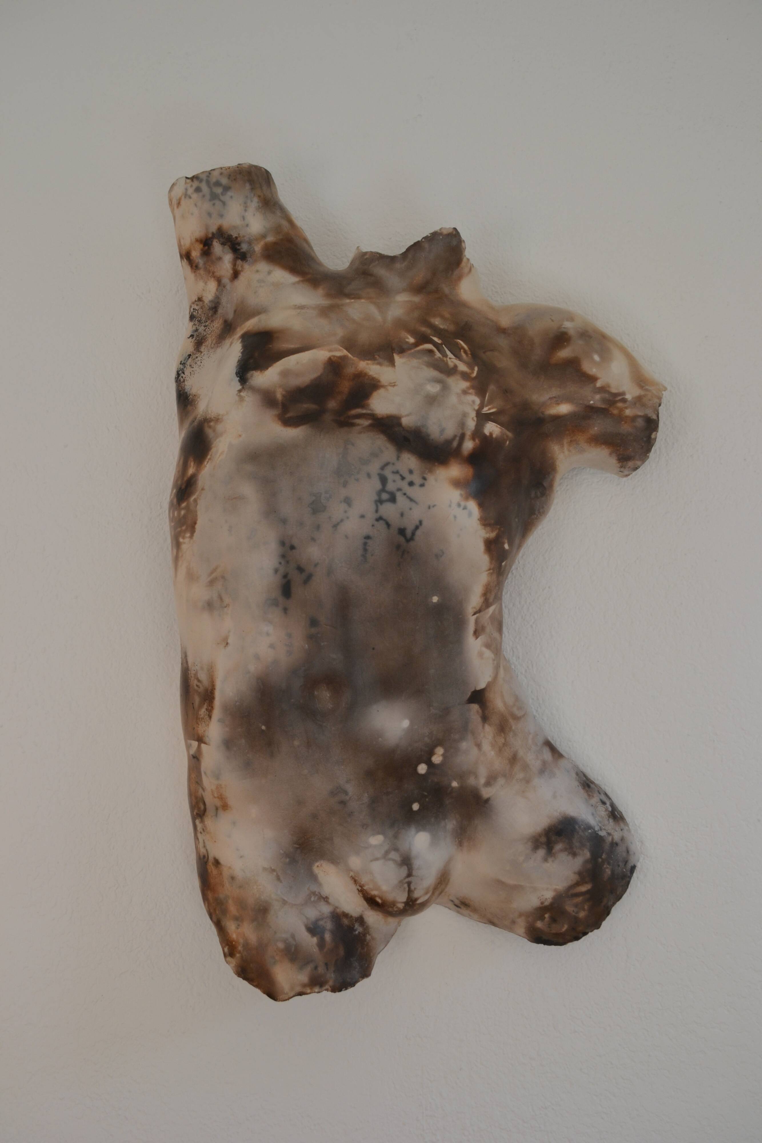 Male torso sculpture by patinated casting, signed to be identified.