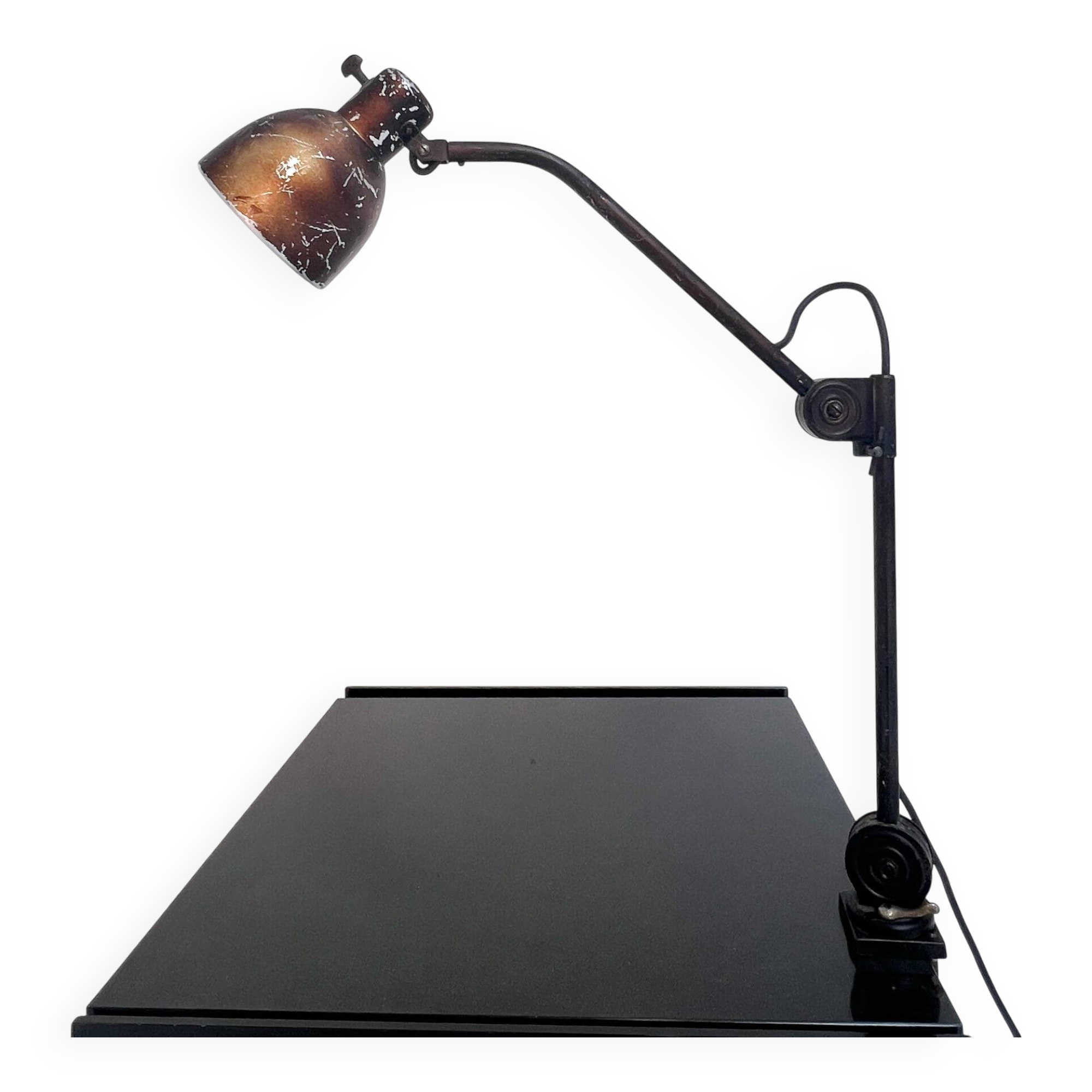 Industrial in height to be adjusted vintage clamp lamp from the 1970s