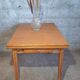 1950s dining table with sliding extensions