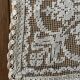 Former embroidered doily