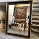 Miroir rectangulaire en bois noir et doré 45 x 35 cm