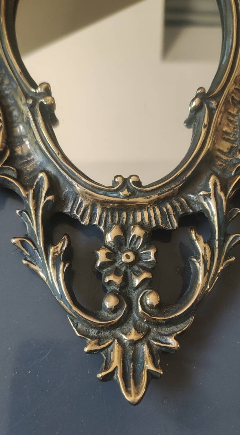 Antique gilded bronze wall mirror. Rococo/Baroque style. Dimensions 31x17cm.