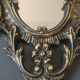 Antique gilded bronze wall mirror. Rococo/Baroque style. Dimensions 31x17cm.