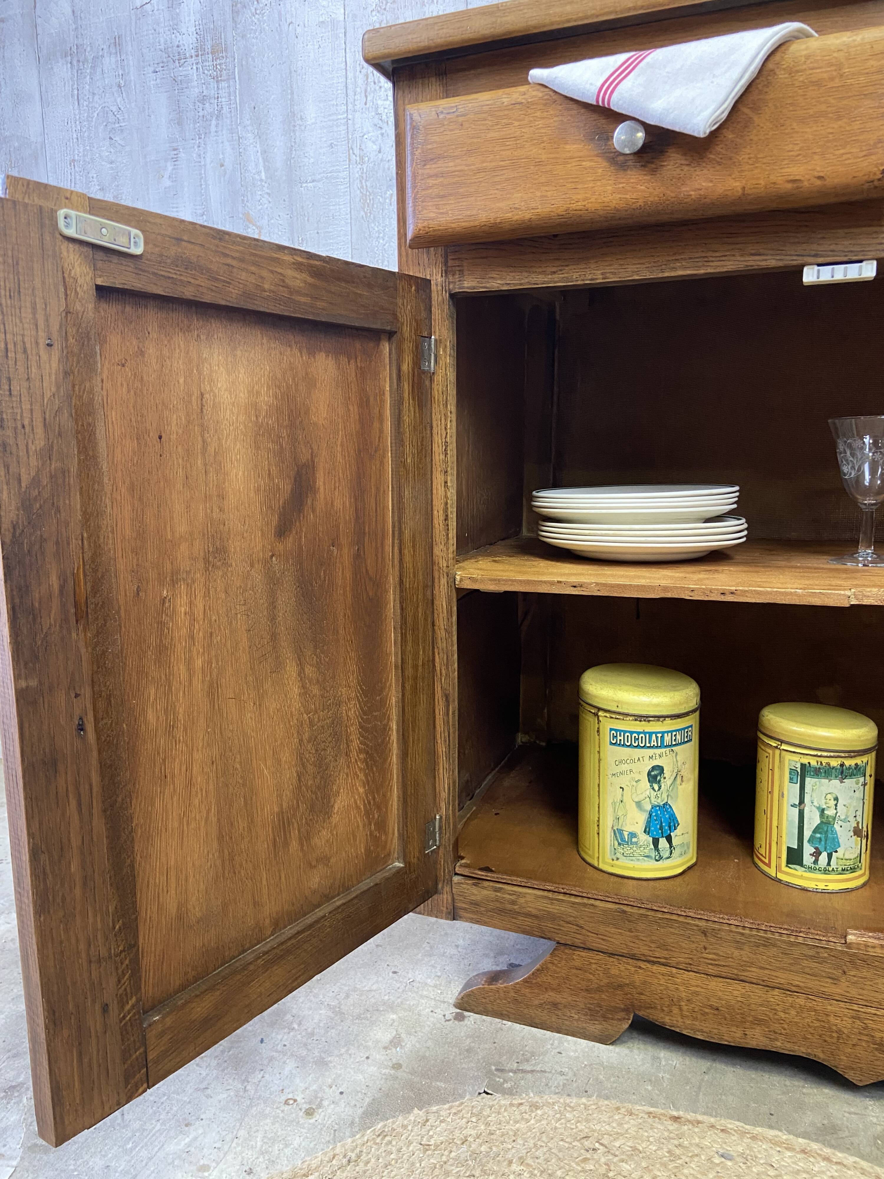 Vintage sideboard with "moustache" base
