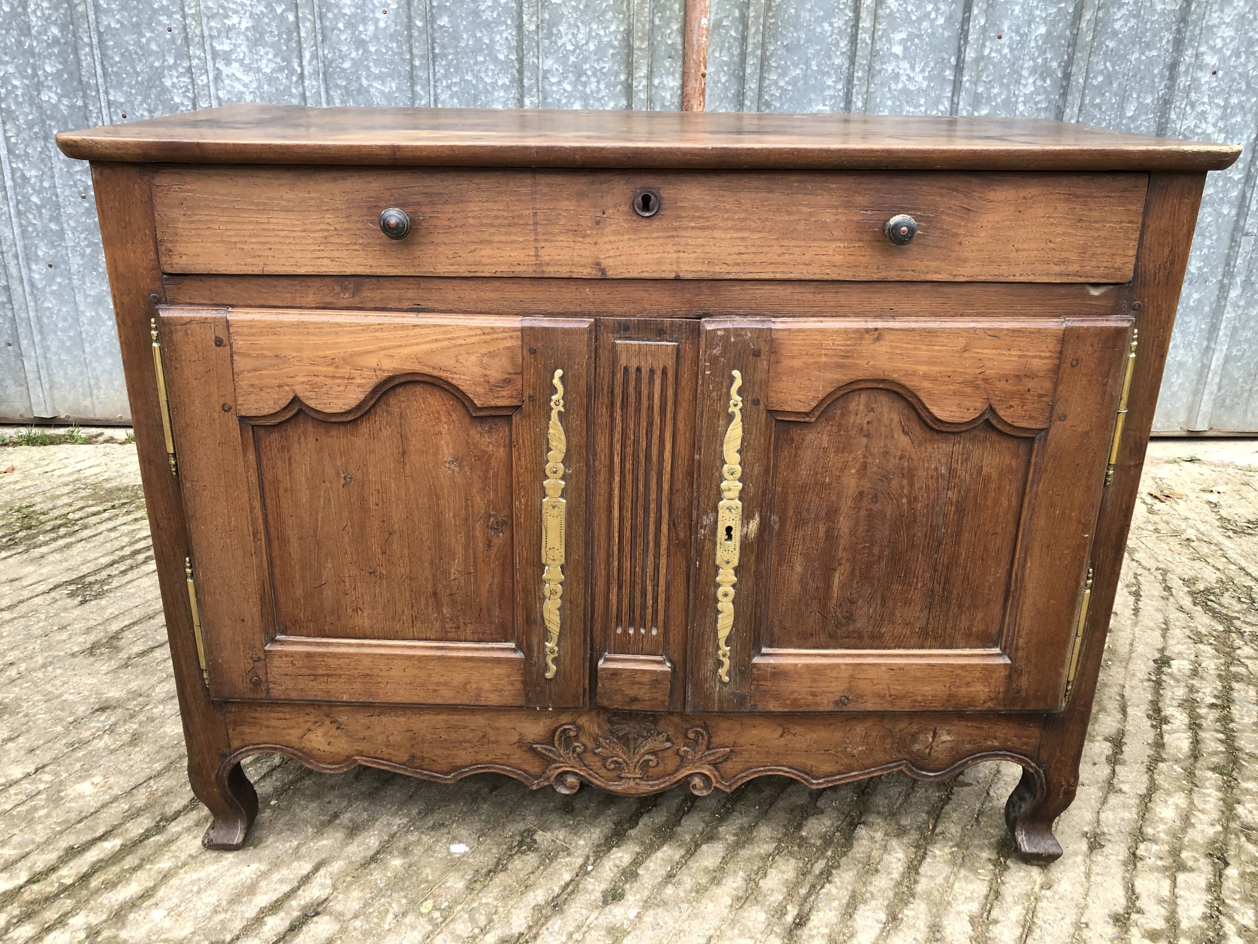 Antique Louis XV low chestnut sideboard with 2 doors and 1 drawer.