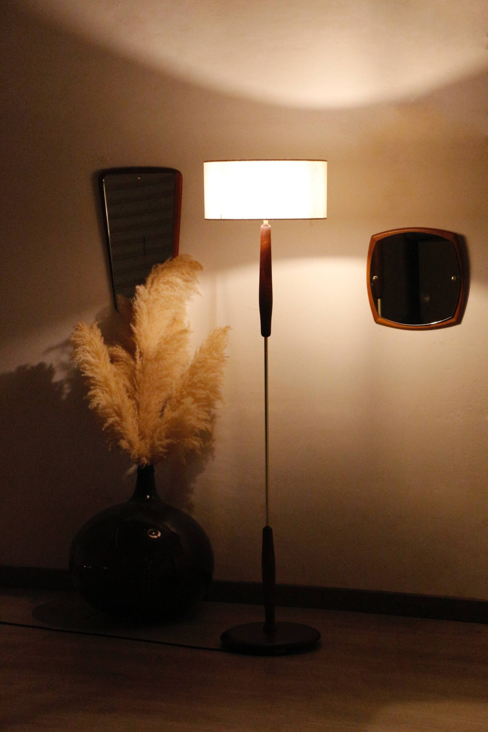 Vintage floor lamp in teak and brass with a cream shade.