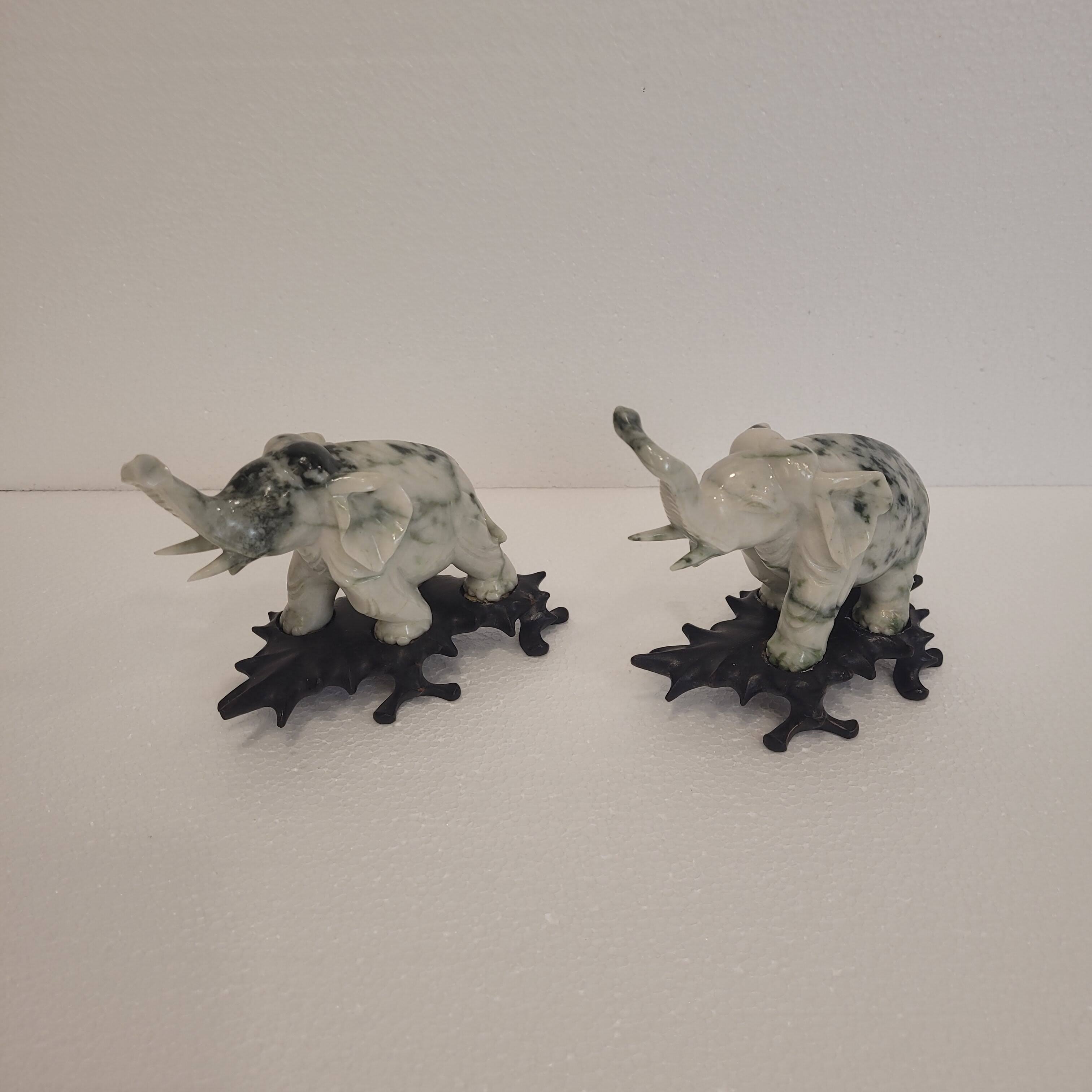 Pair of elephant paperweights, veined marble, 80s - France