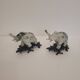 Pair of elephant paperweights, veined marble, 80s - France