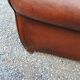 Paire de fauteuils club en cuir brun des années 30