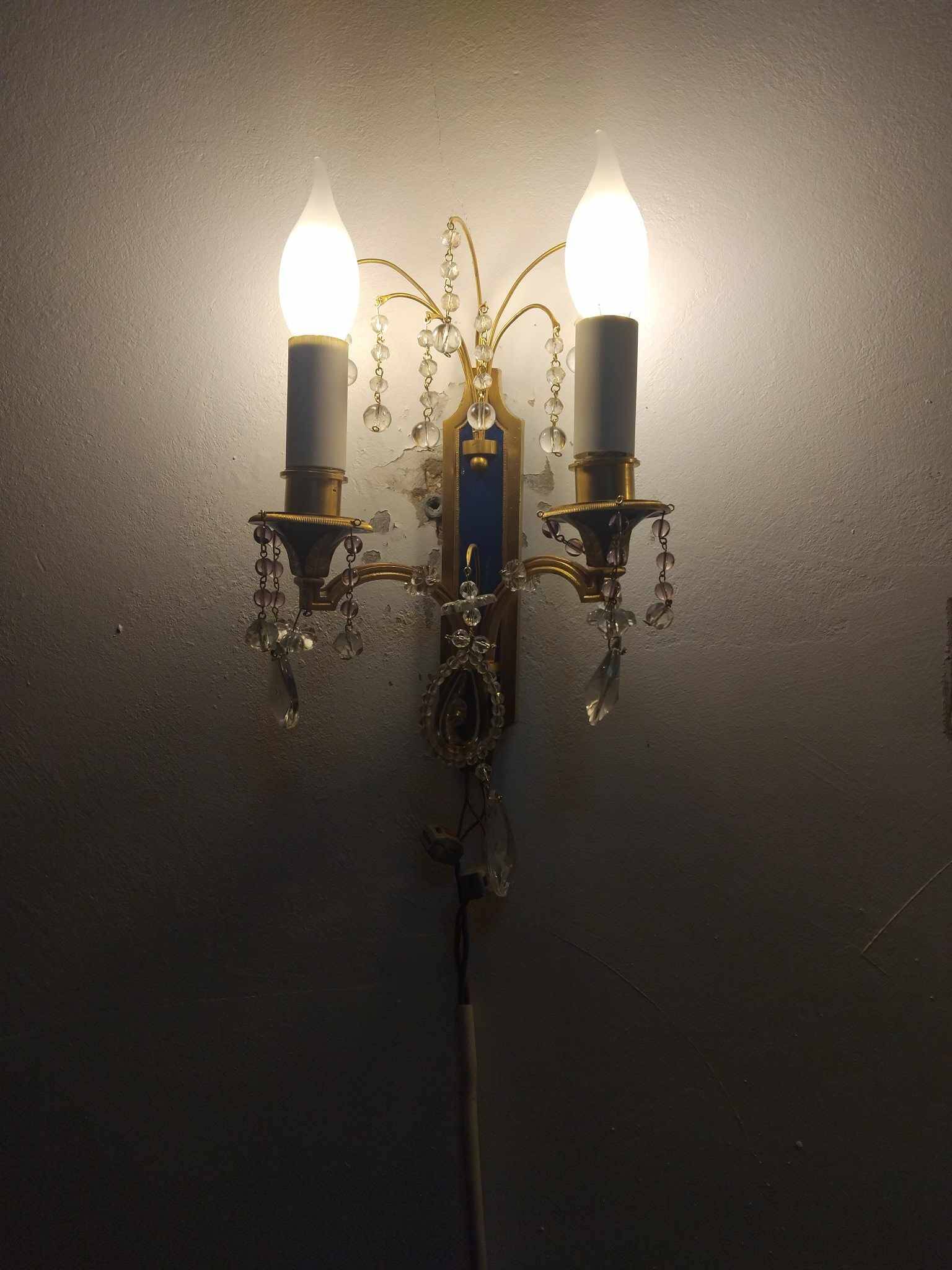 Pair of Louis XVI style gilt bronze wall lights