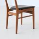 Set of six Danish dining chairs in teak and faux leather Denmark 1960