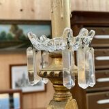 Golden wooden chandelier with crystal pendants from the 19th century.