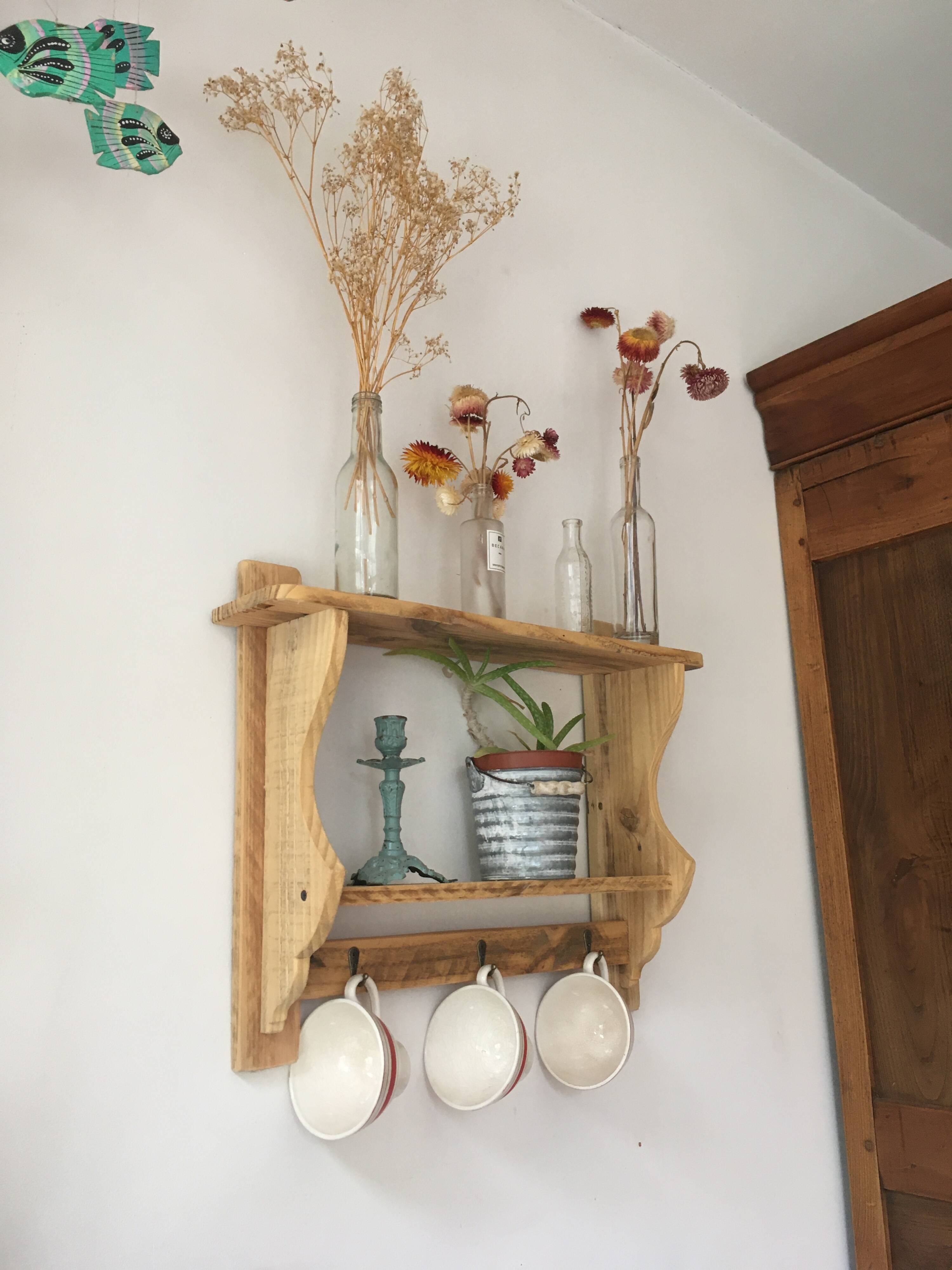wall-mounted bakery shelf