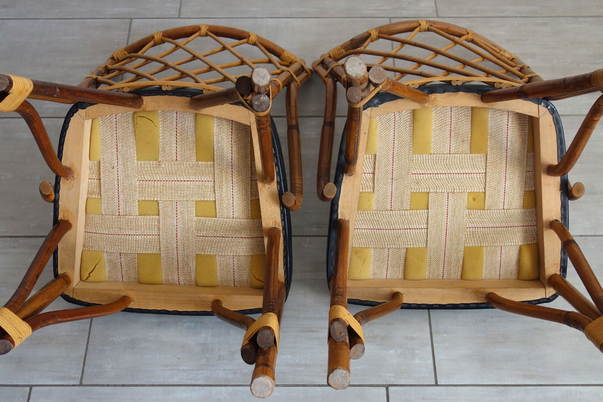 Pair of rattan and black skai bamboo chairs, 60s