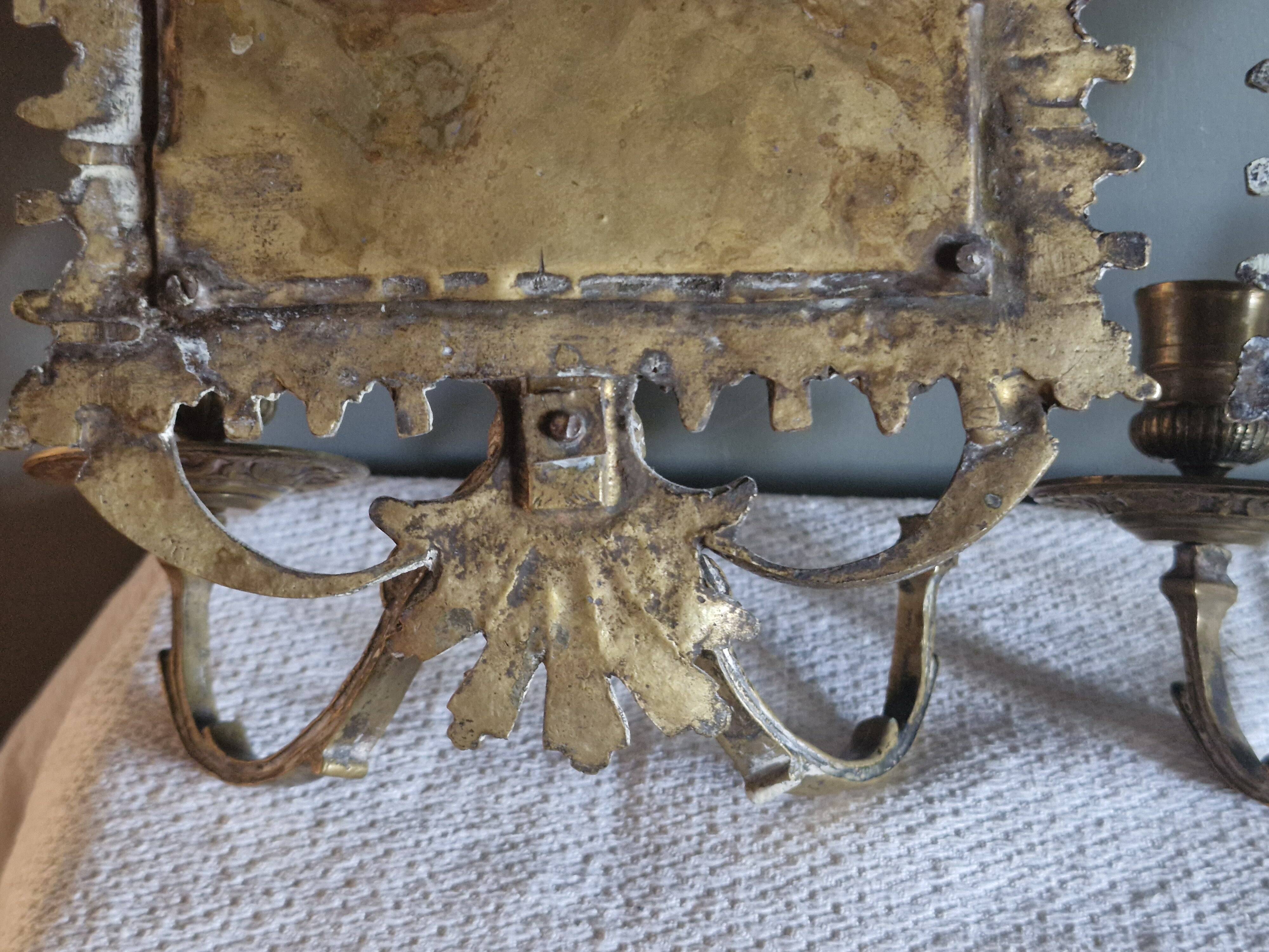 Pair of mirror sconces/candle holders in 19th-century bronze.