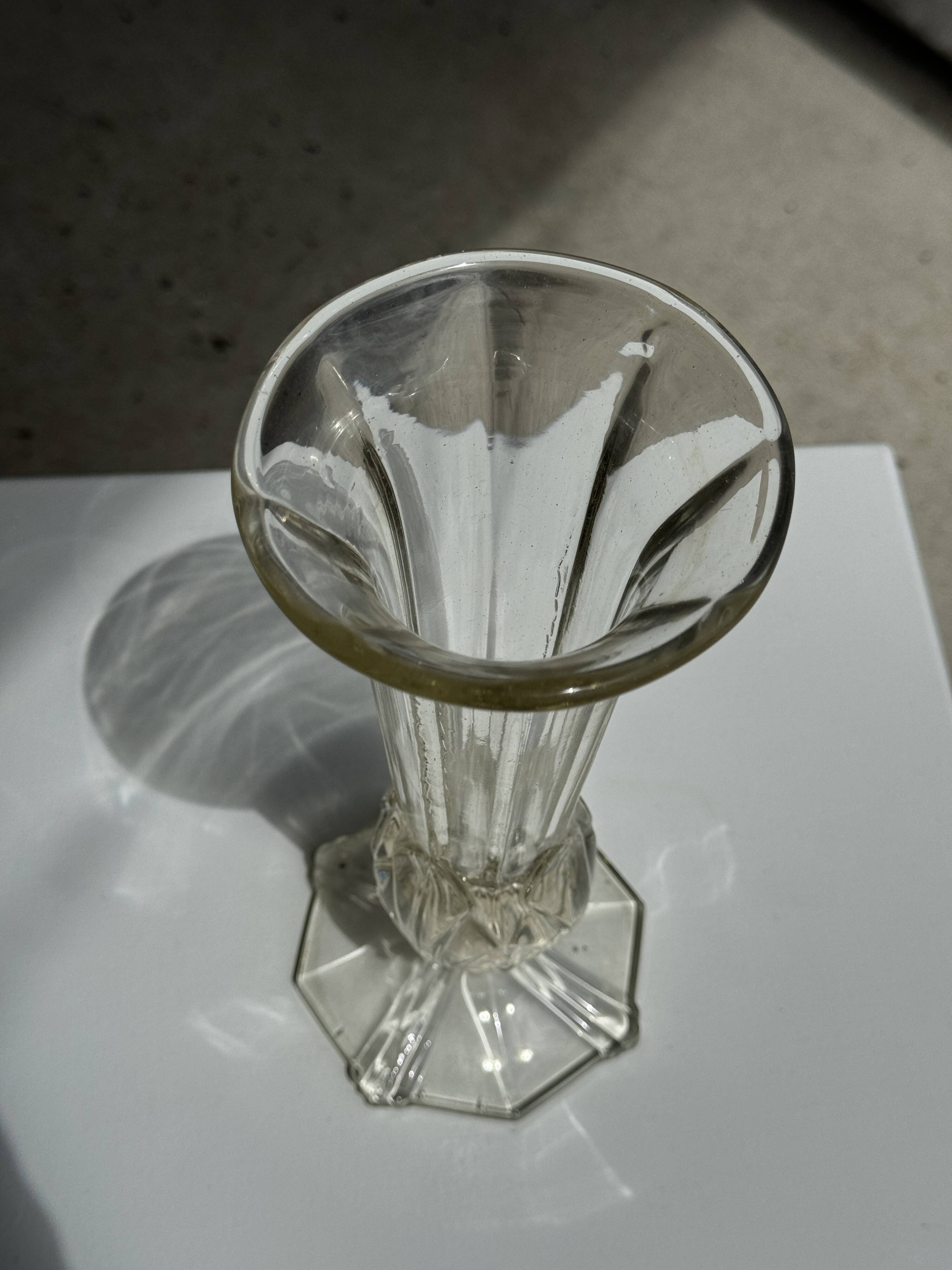 Art deco style flared neck pedestal vase in blown glass