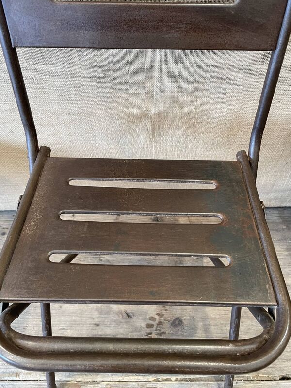 Chaise industrielle en métal pliante