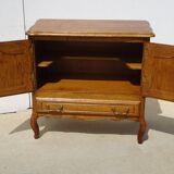 Oak sideboard with swivel screen tray
